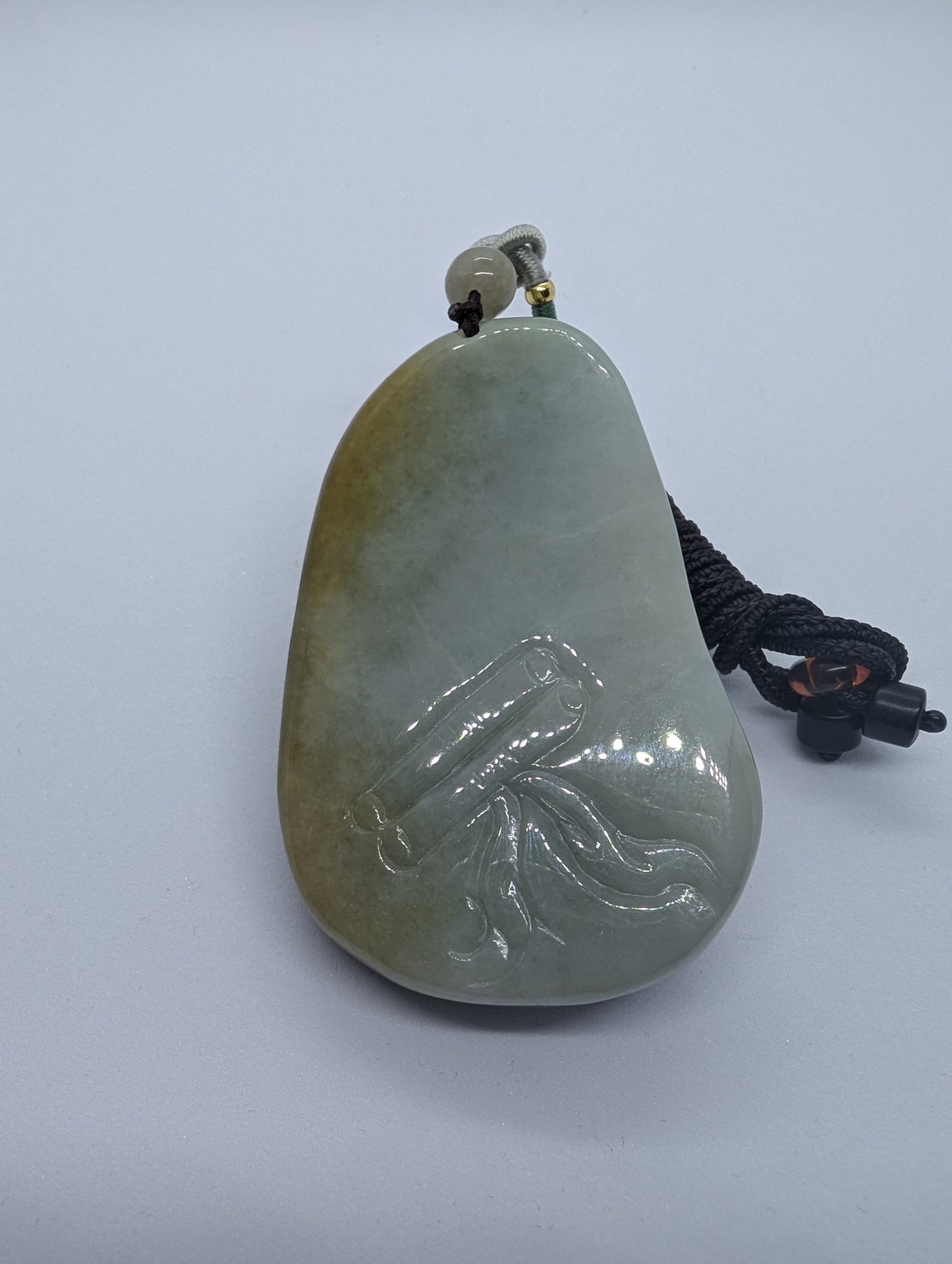 Bluish green jadeite pendant