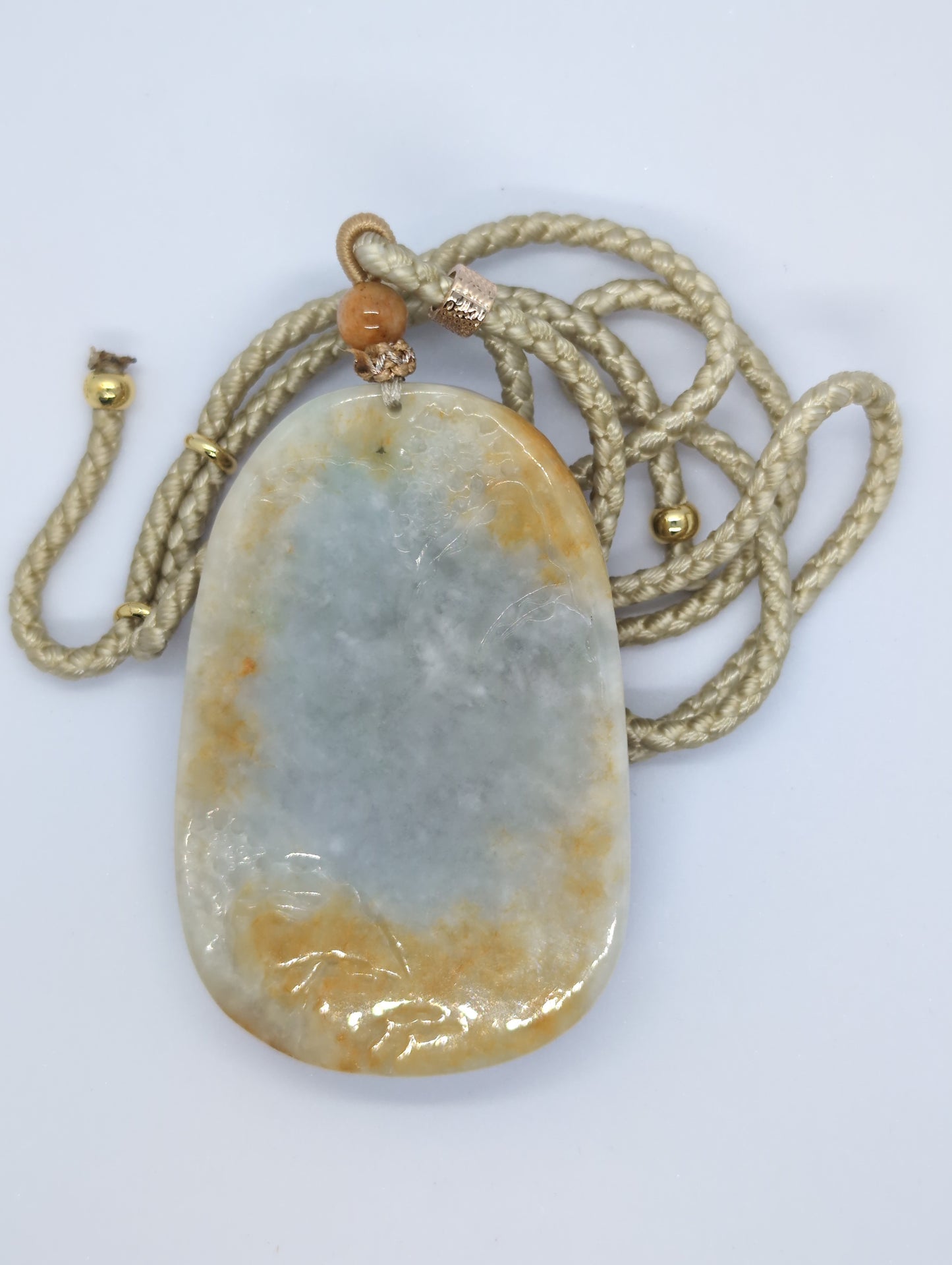 Light green and yellow jadeite pendant