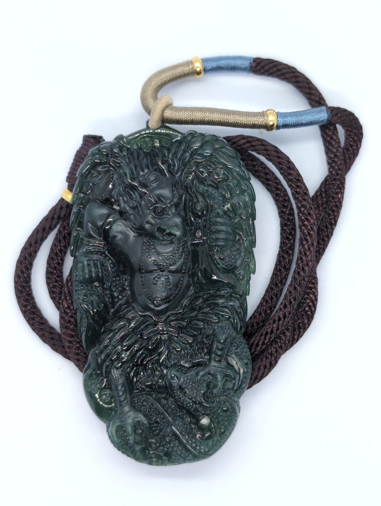 Dark translucent green jadeite pendant