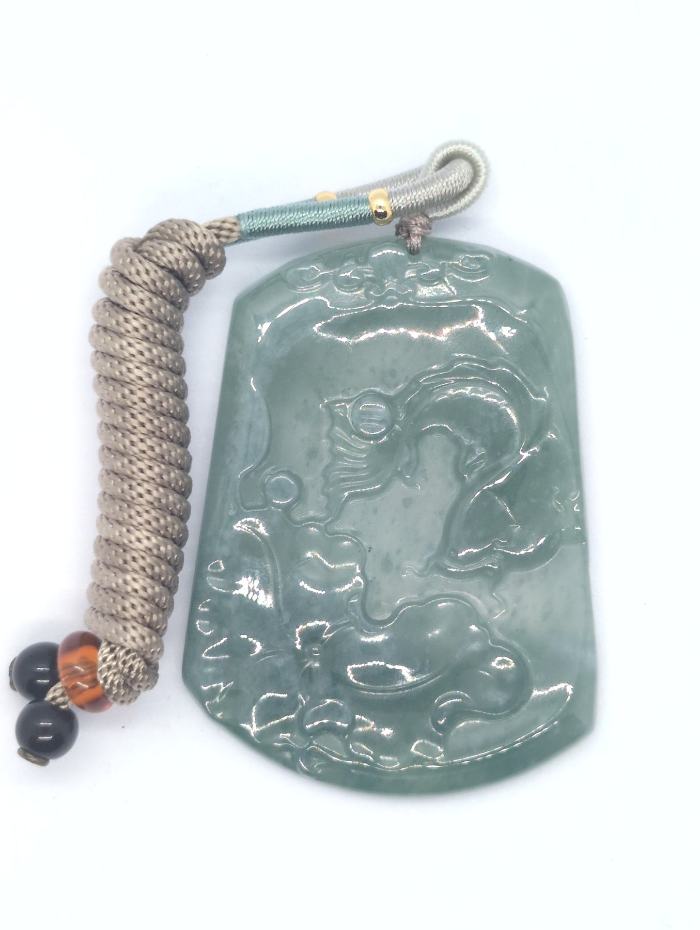Icy green jadeite pendant