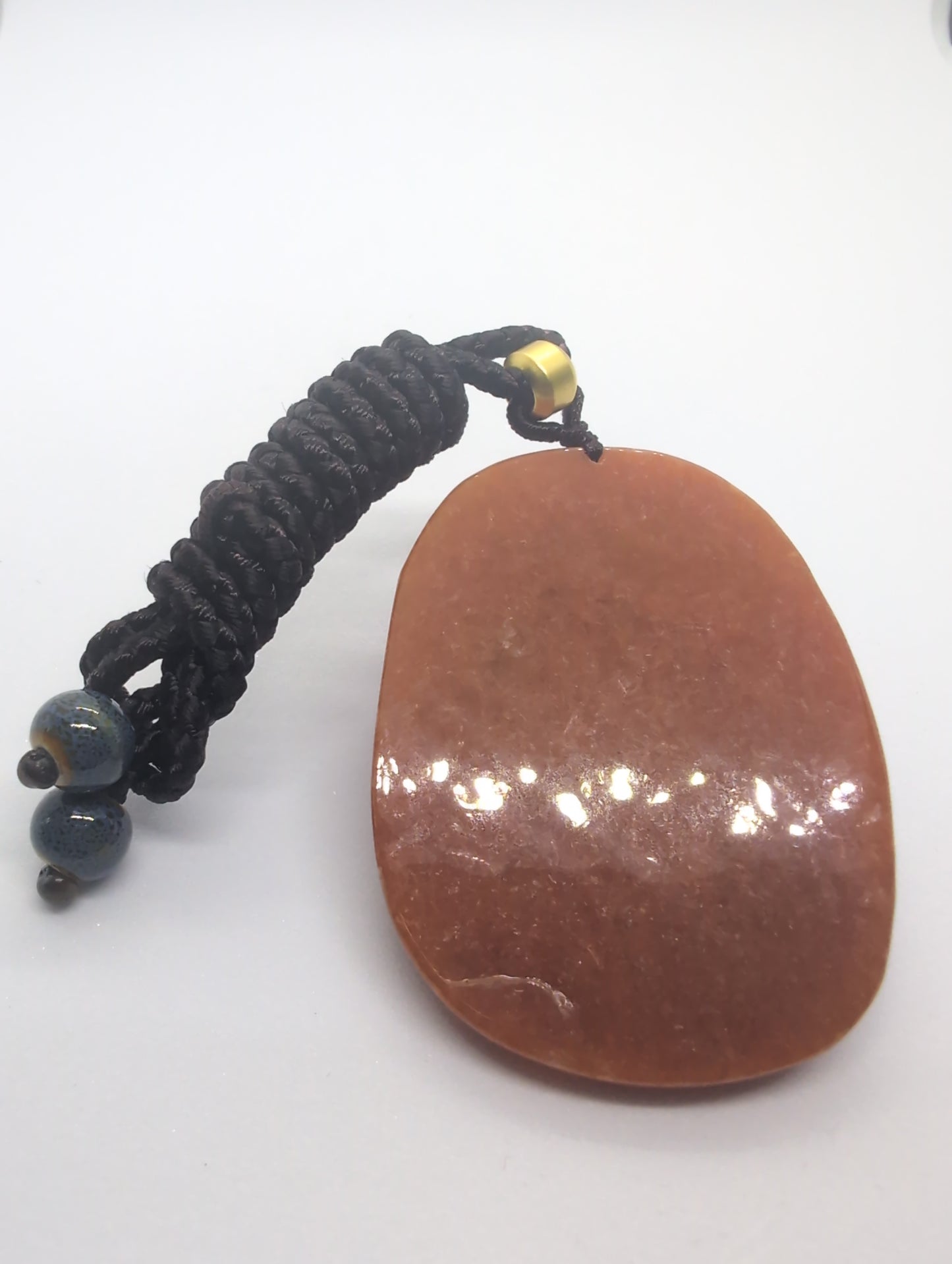 Red jadeite pendant