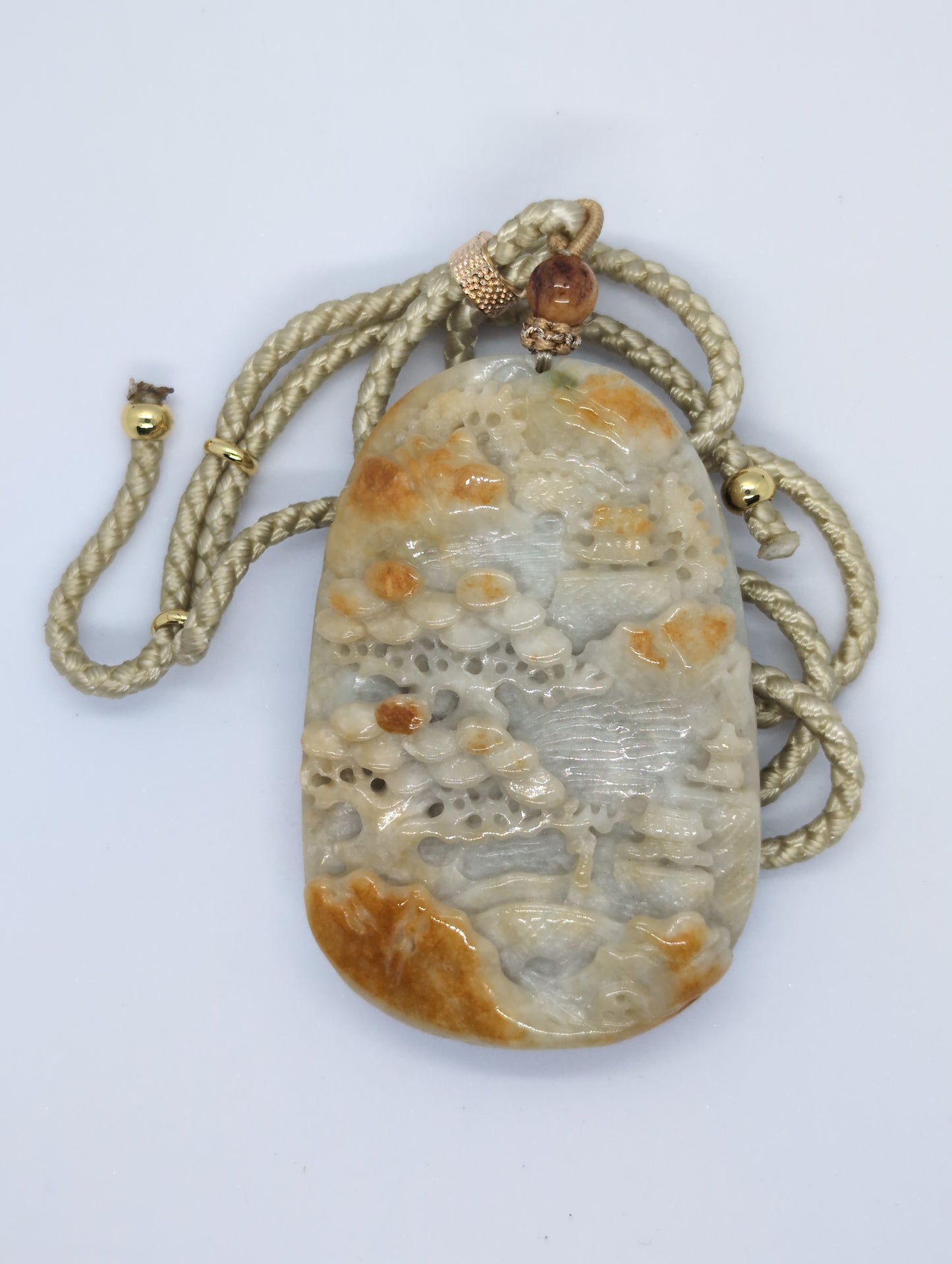 Light green and yellow jadeite pendant
