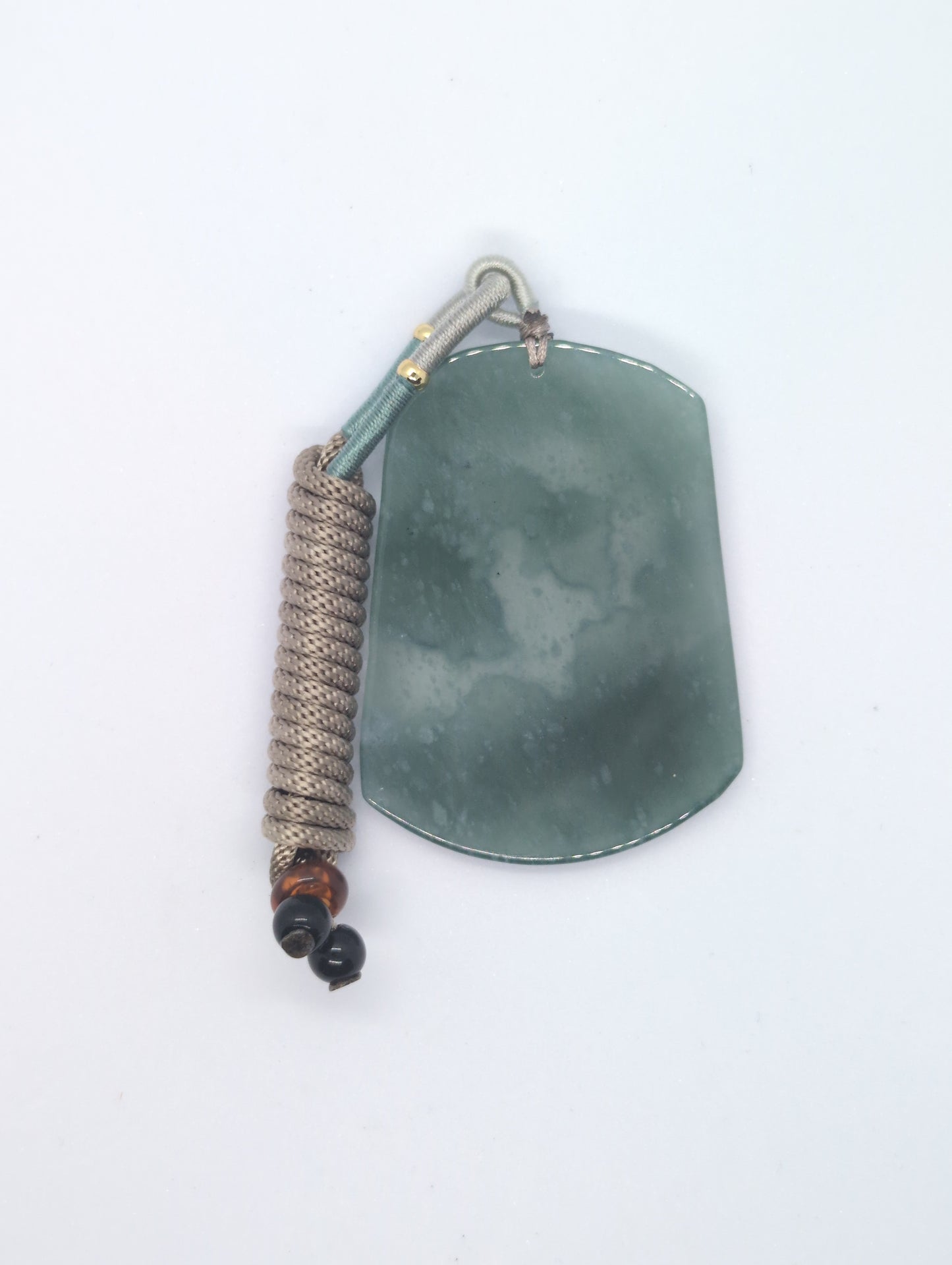 Icy green jadeite pendant